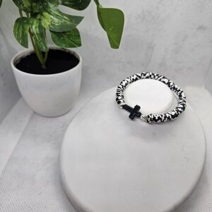 Elegant Monochrome Beaded Bracelet with Cross Charm
